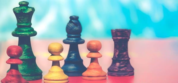 Digital leadership: Colourful chess pieces in rows