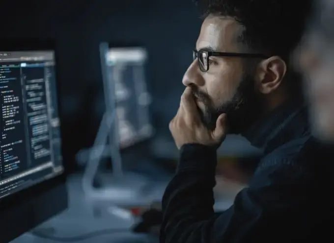 Developers and project owners work on a system introduction during live operation