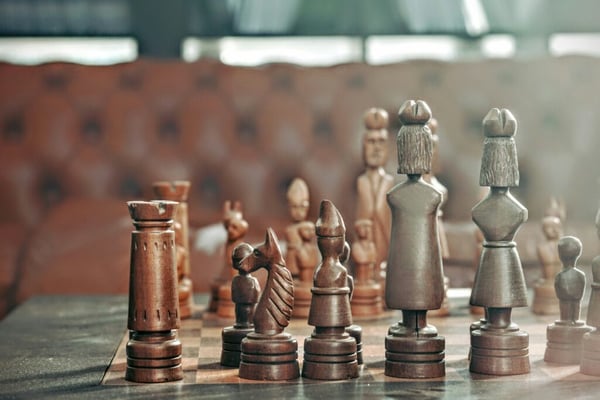 Strategy consultants: Chess pieces on a board