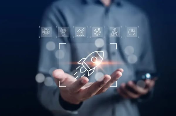 SMART goals: Hand holding a rocket icon surrounded by metric symbols