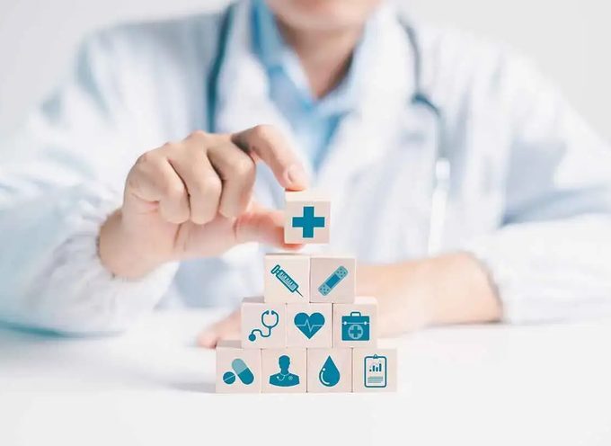 Healthcare professional working through digital selection criteria