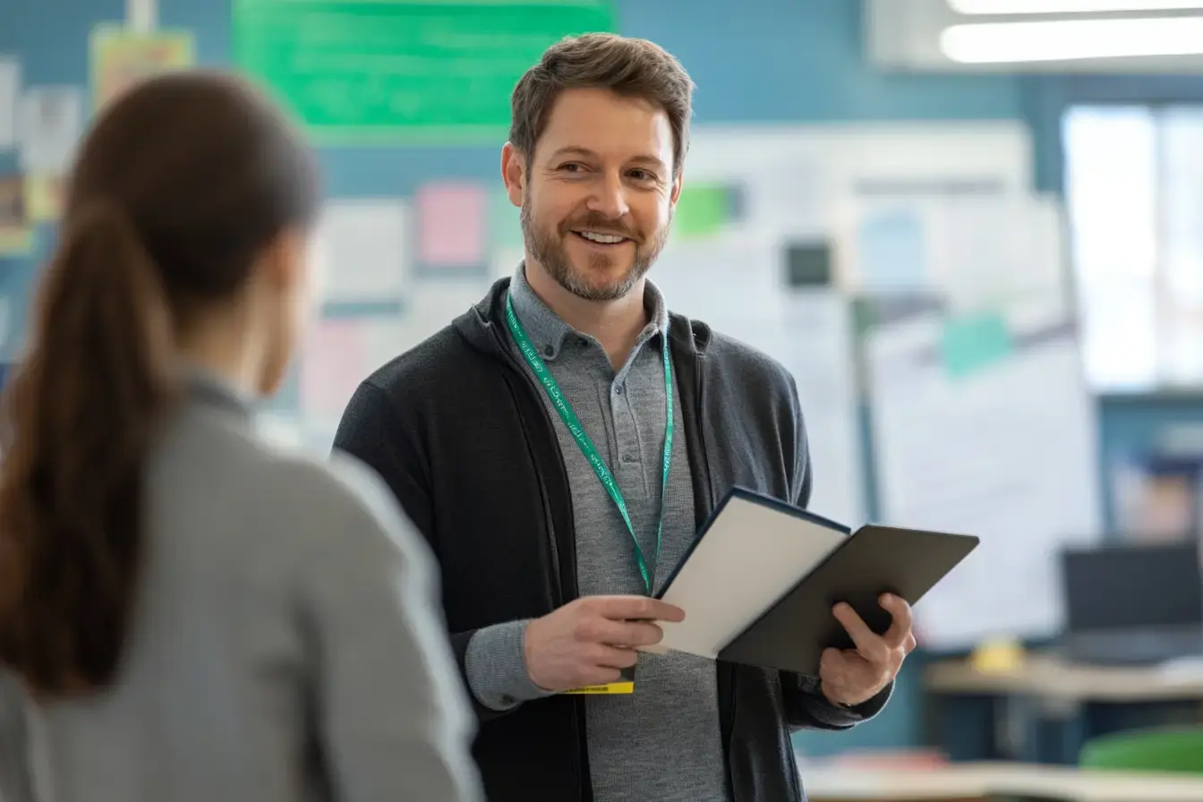 u6398156499_professional_rollout_manager_standing_in_a_modern_3fe2e205-595b-4cd8-9a48-82152afb3fbd_2